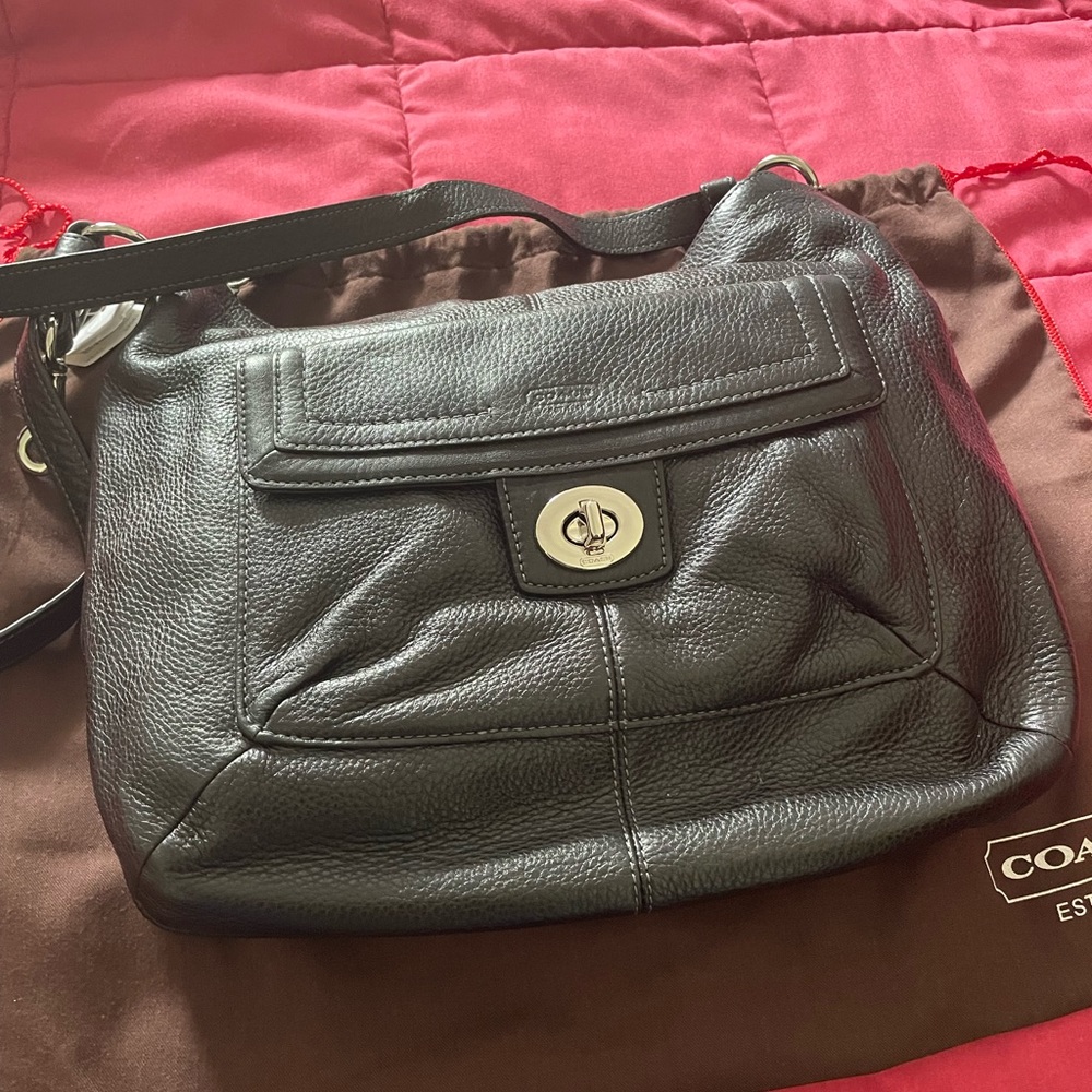 New with tag never been worn black Coach bag